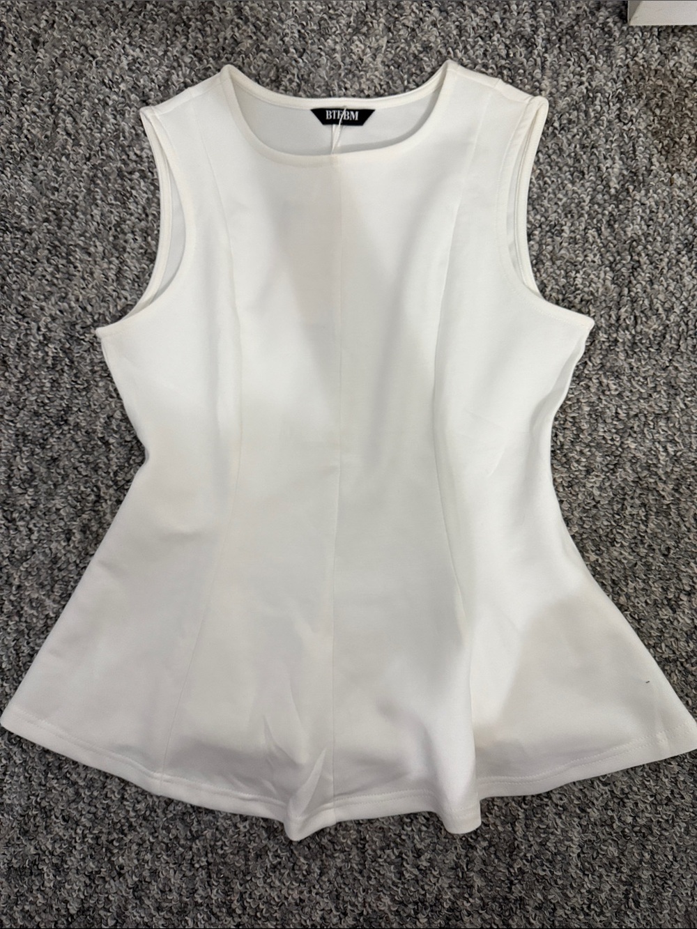 White Sleeveless Peplum Top